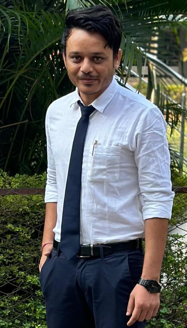 Dr Angad J. K.